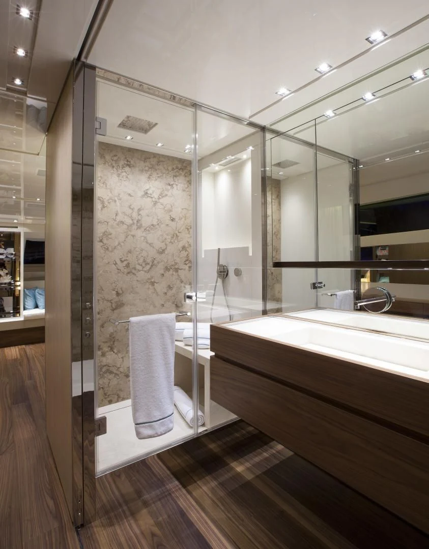 a bathroom with a glass shower aboard GOLDEN YACHT Yacht for Sale