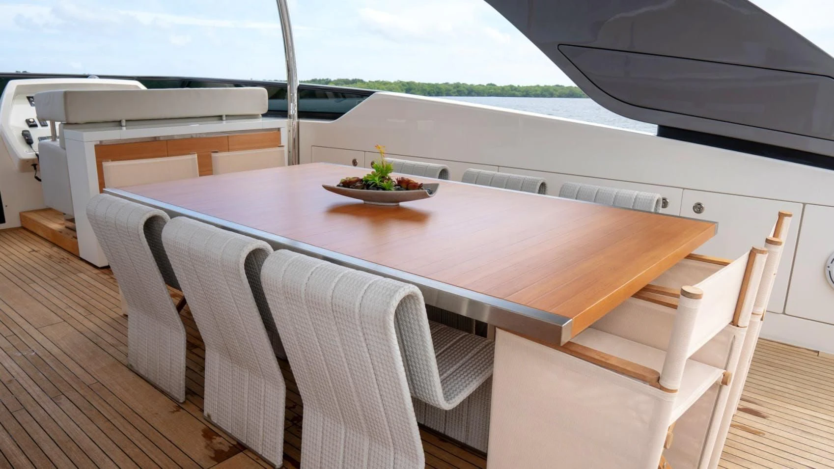 a table with chairs around it aboard GOLDEN YACHT Yacht for Sale
