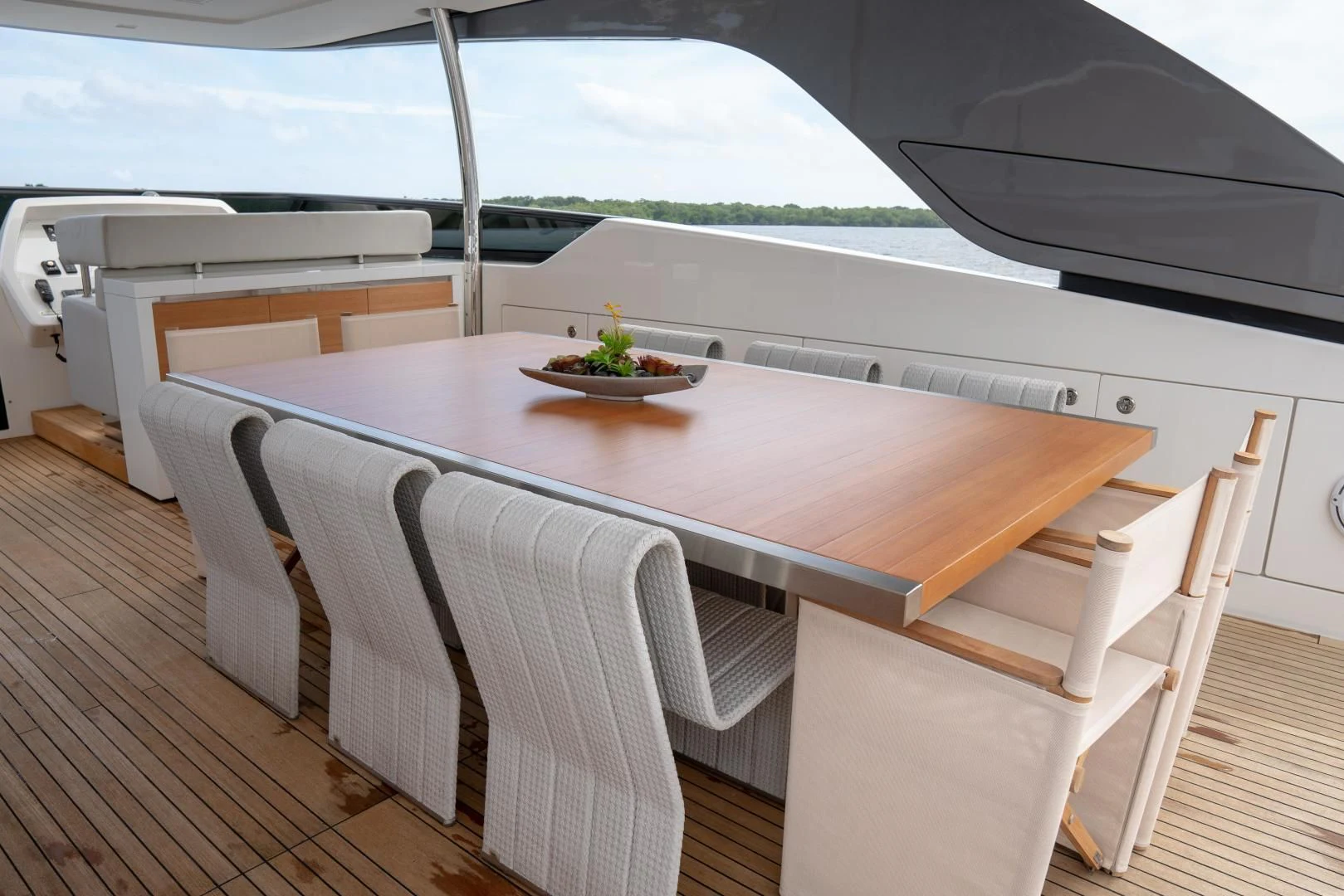 a table with chairs around it aboard GOLDEN YACHT Yacht for Sale