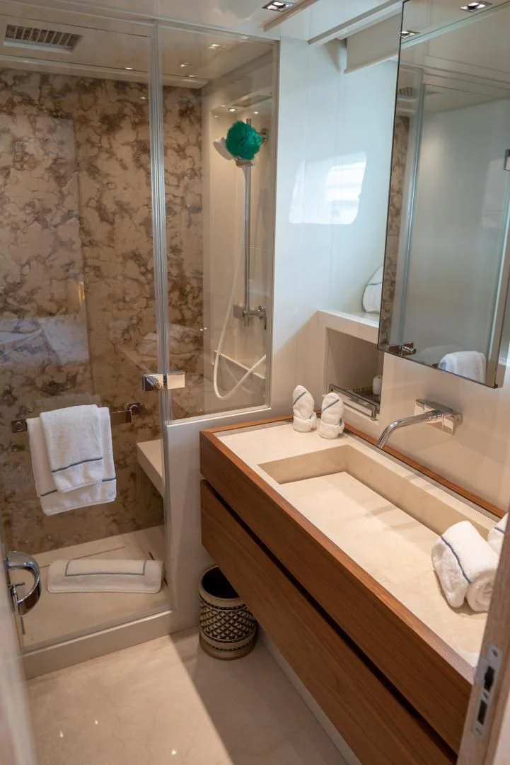 a bathroom with a glass shower aboard GOLDEN YACHT Yacht for Sale