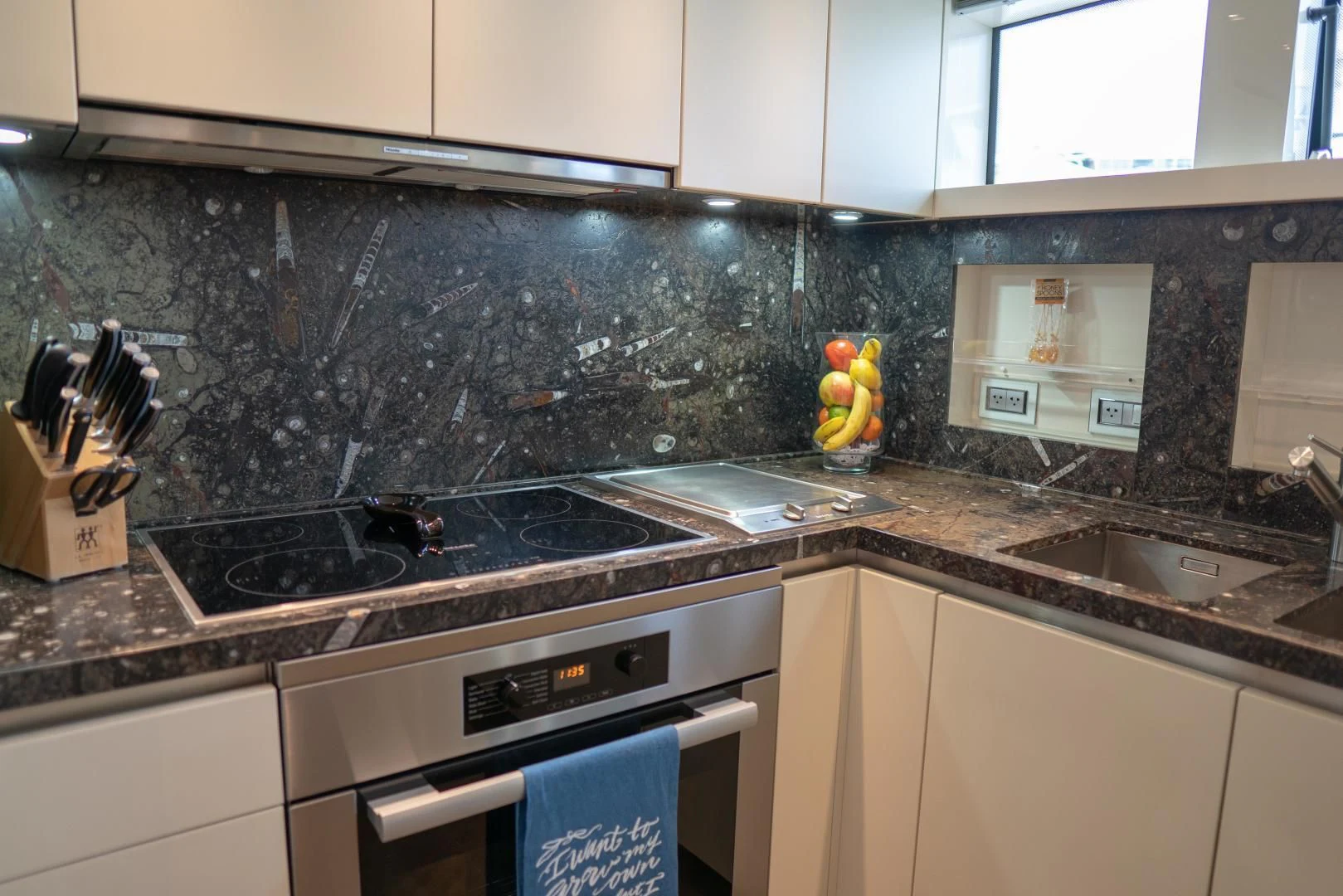 a kitchen with a black counter top aboard GOLDEN YACHT Yacht for Sale