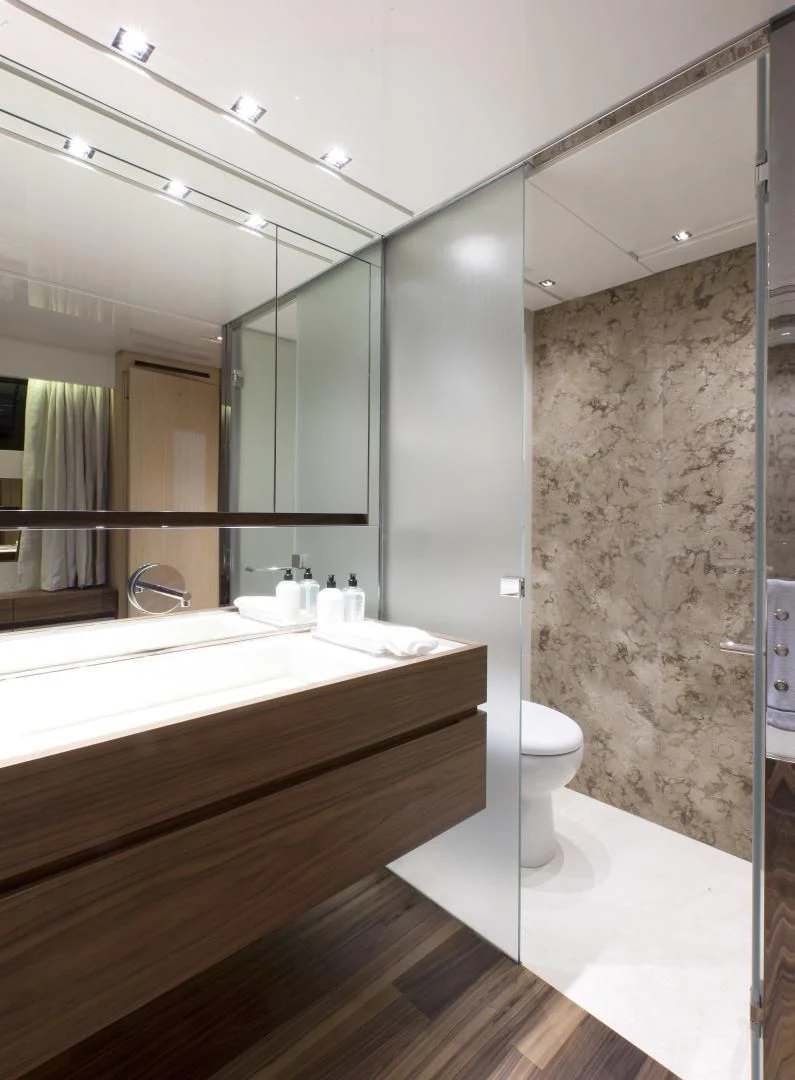 a bathroom with a glass shower aboard GOLDEN YACHT Yacht for Sale