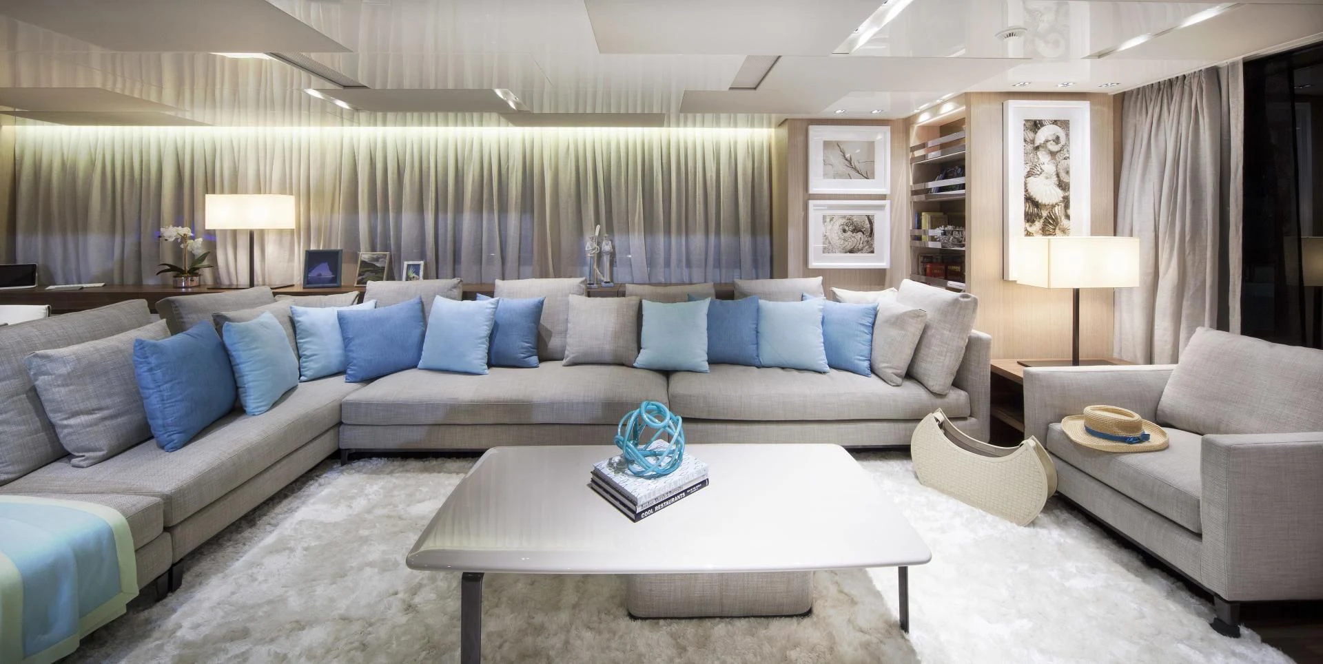 a living room with a couch and a coffee table aboard GOLDEN YACHT Yacht for Sale