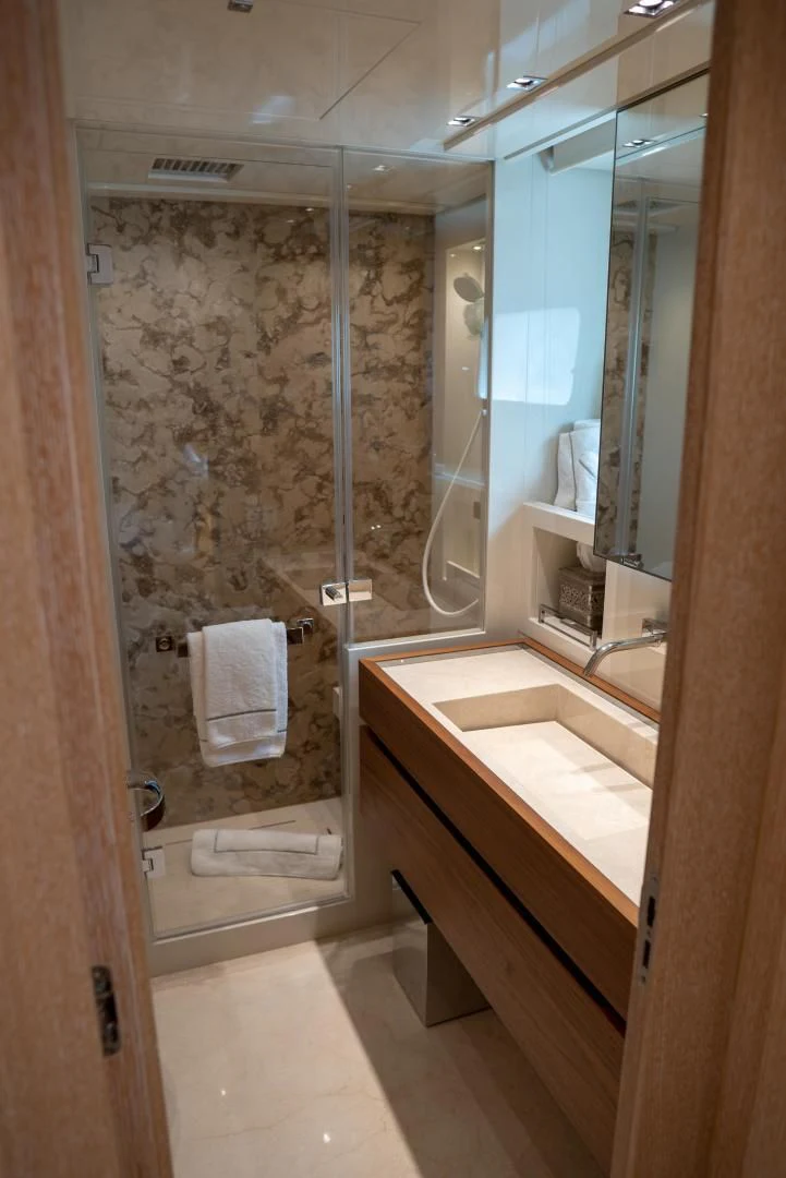 a bathroom with a glass shower aboard GOLDEN YACHT Yacht for Sale