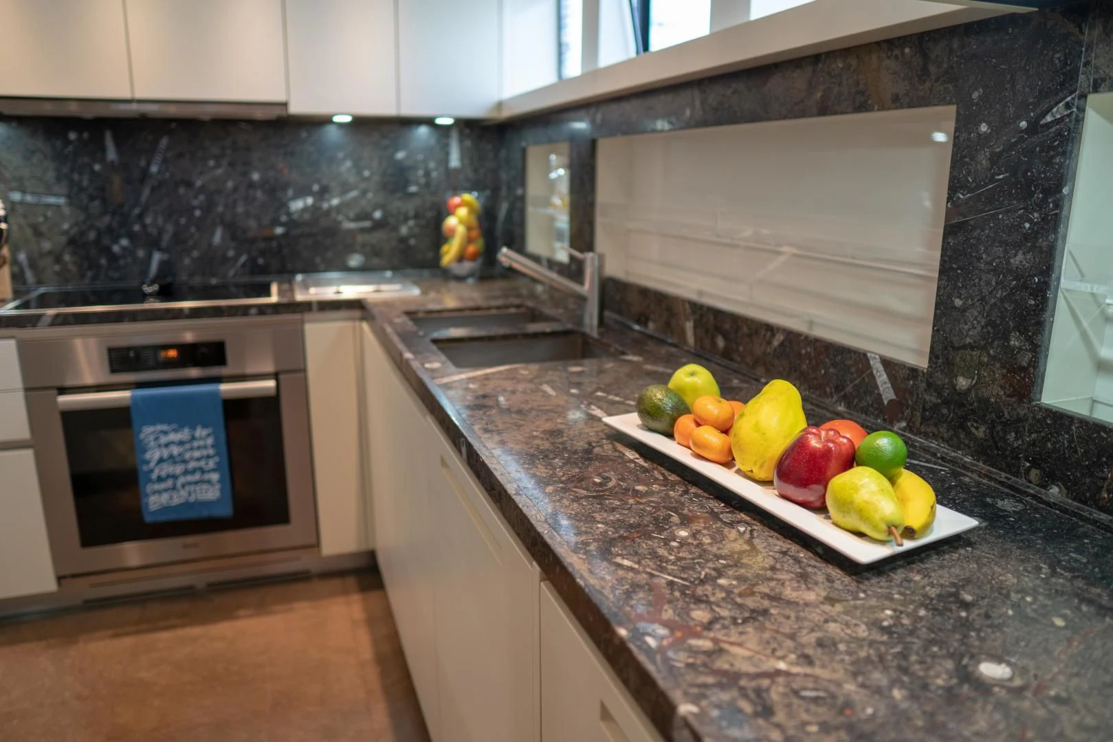 a kitchen with a marble counter top aboard GOLDEN YACHT Yacht for Sale