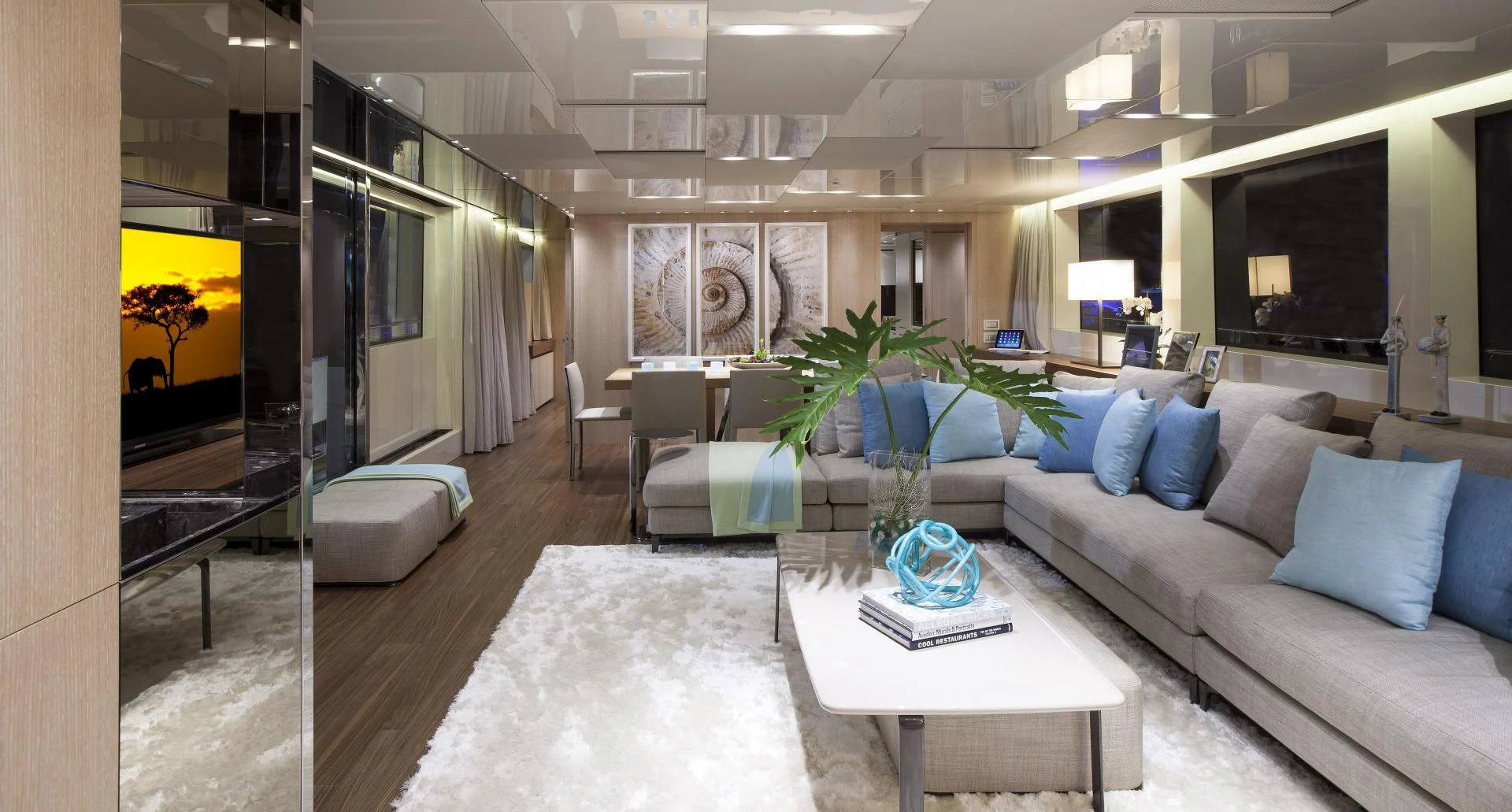 a living room with a couch and a table aboard GOLDEN YACHT Yacht for Sale