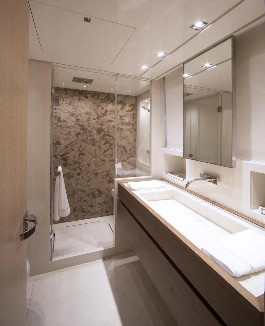 a bathroom with a glass shower aboard GOLDEN YACHT Yacht for Sale