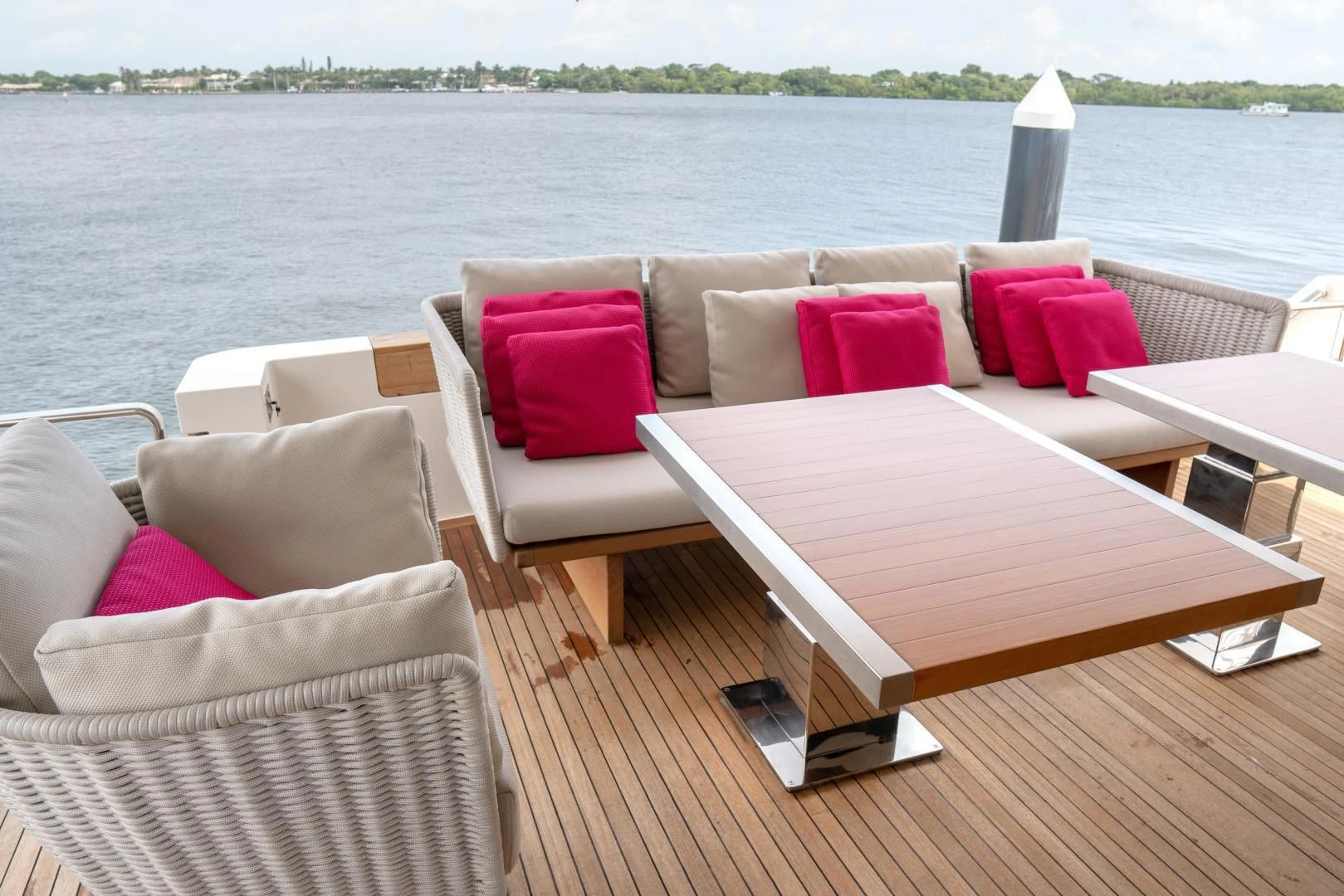a deck with couches and a table and chairs aboard GOLDEN YACHT Yacht for Sale