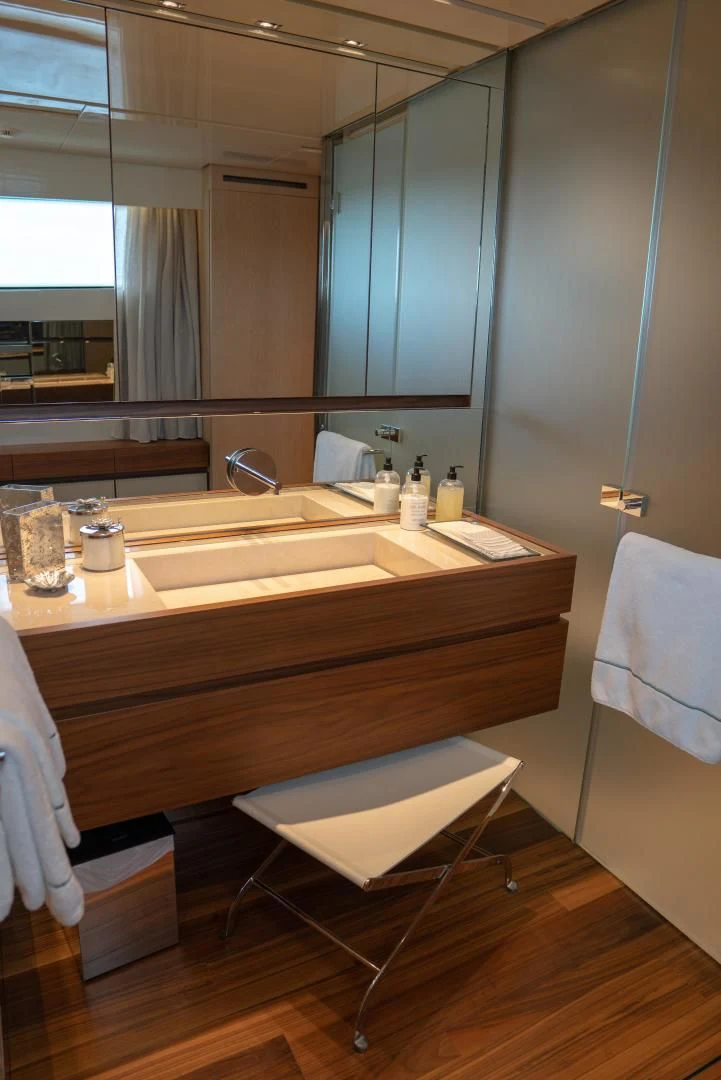 a bathroom with a large mirror aboard GOLDEN YACHT Yacht for Sale