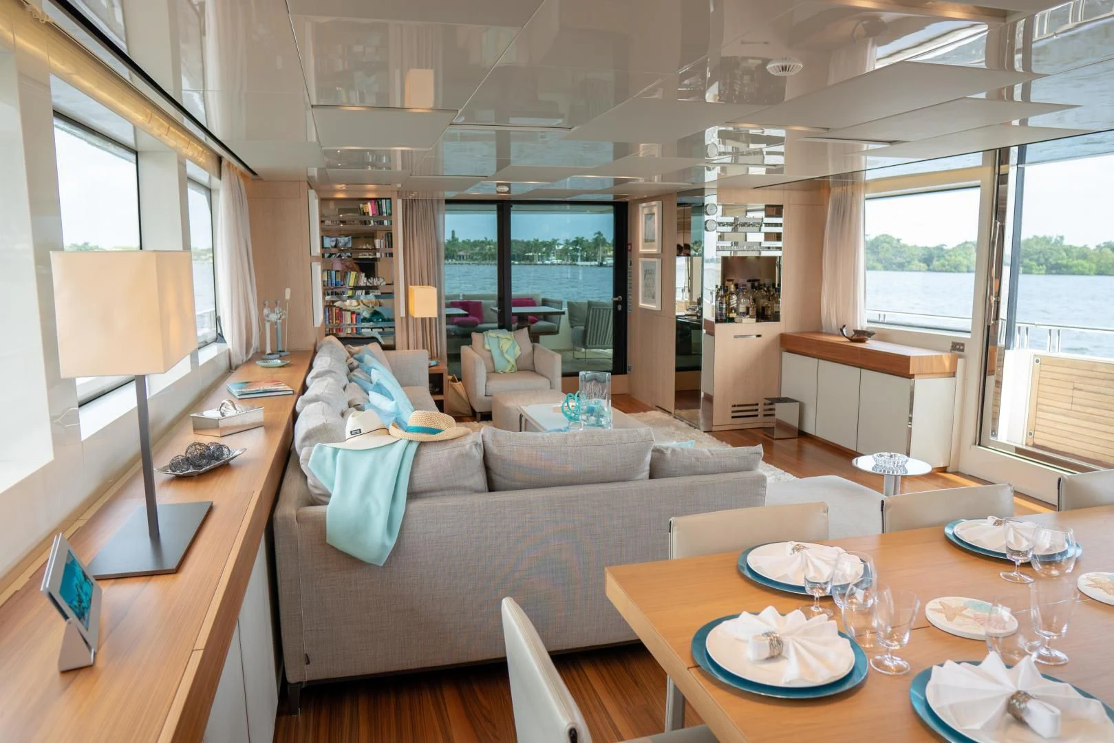 a living room with a couch and a table aboard GOLDEN YACHT Yacht for Sale