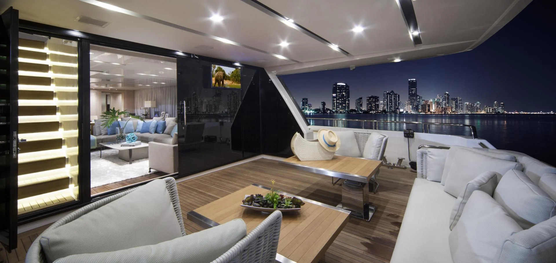 a living room with a large window aboard GOLDEN YACHT Yacht for Sale