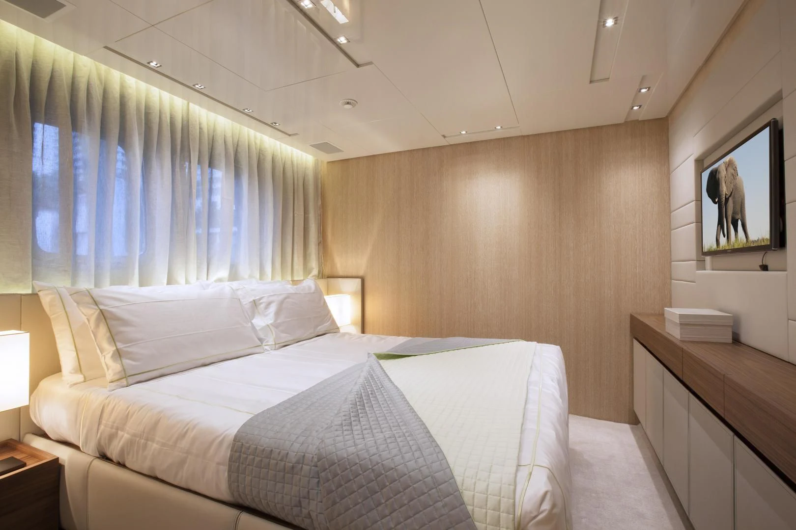 a bed with white sheets aboard GOLDEN YACHT Yacht for Sale