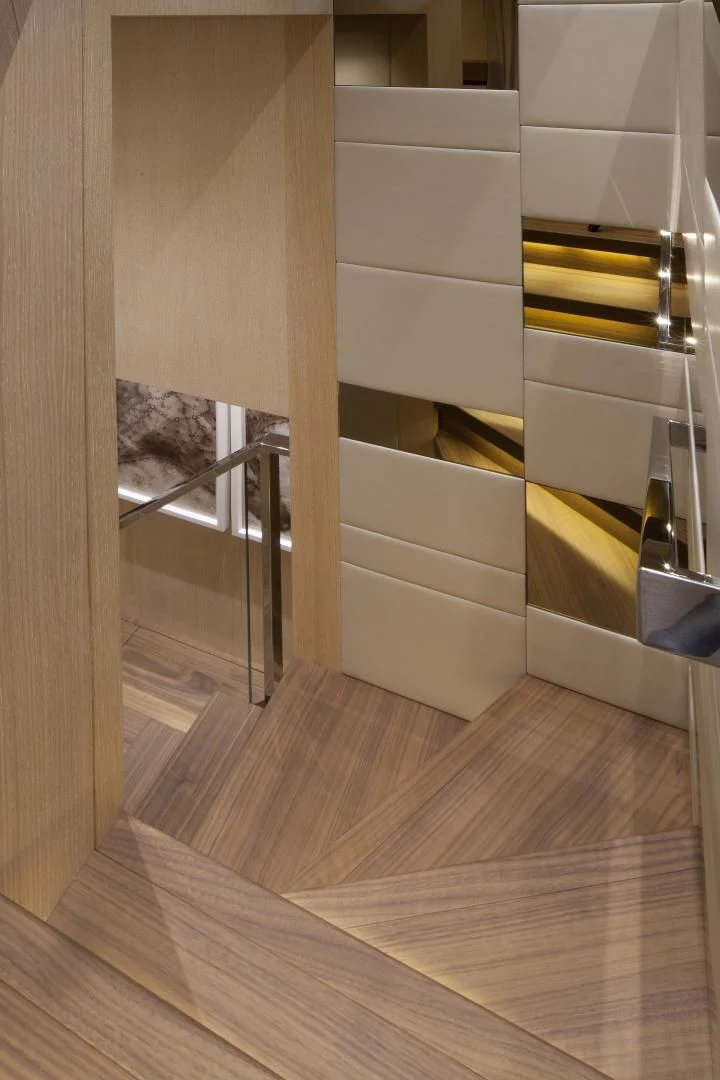 a room with a wood floor and white cabinets aboard GOLDEN YACHT Yacht for Sale