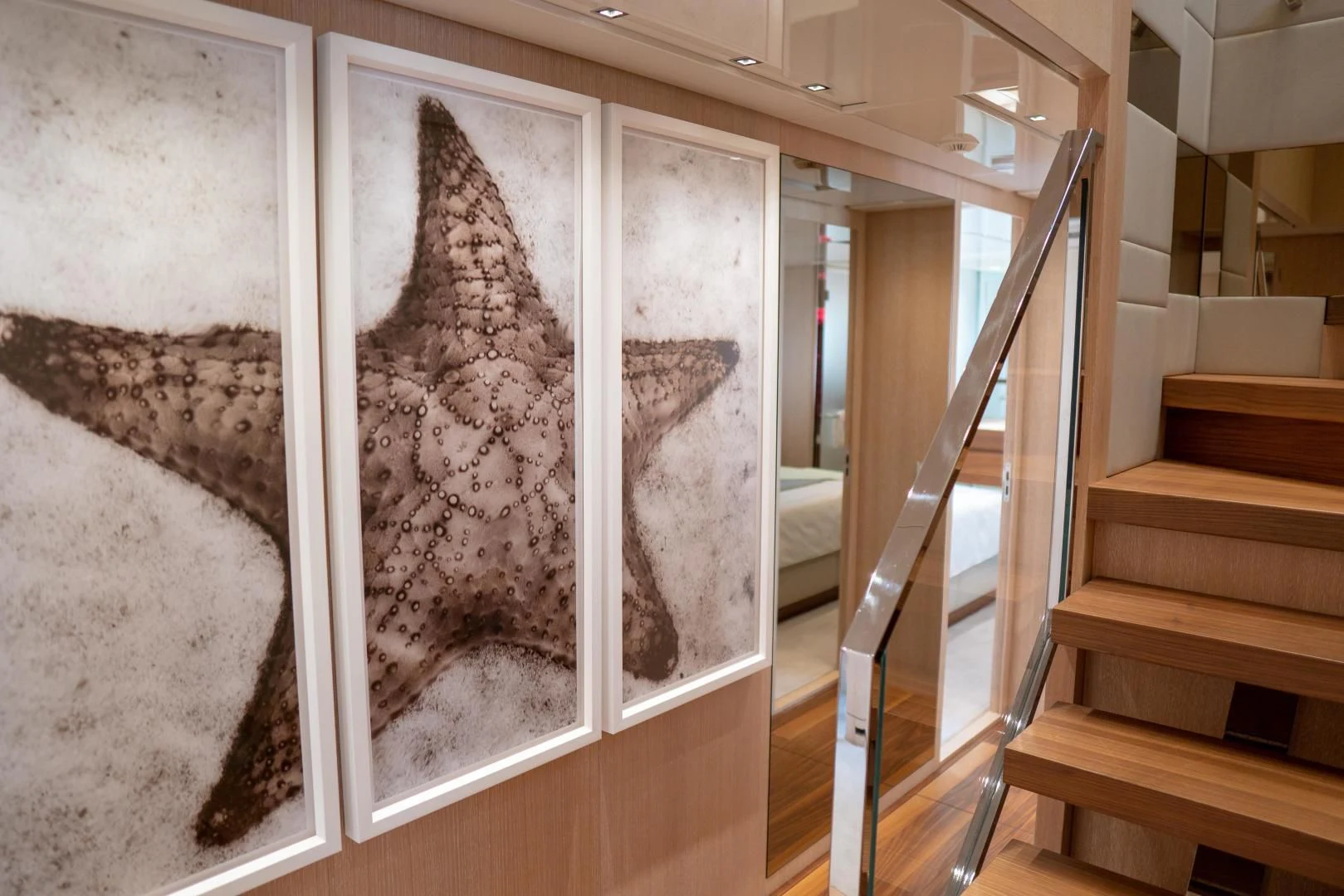 a cat sitting on a staircase aboard GOLDEN YACHT Yacht for Sale