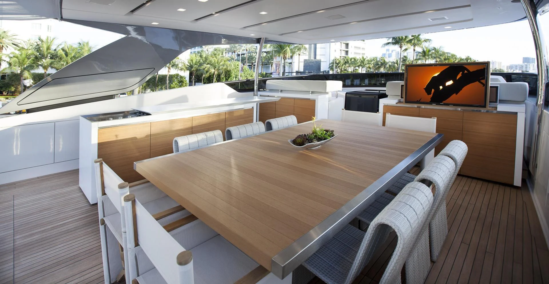 a room with a table and chairs aboard GOLDEN YACHT Yacht for Sale