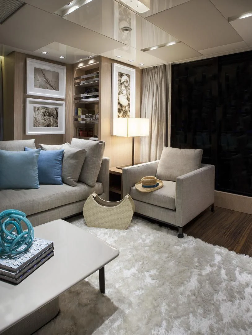 a living room with a white couch and a table aboard GOLDEN YACHT Yacht for Sale