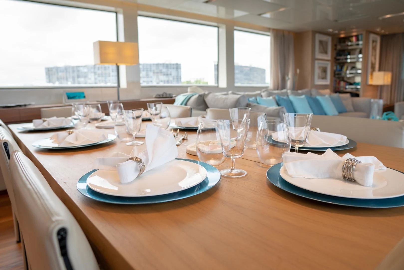 a table with plates and glasses aboard GOLDEN YACHT Yacht for Sale