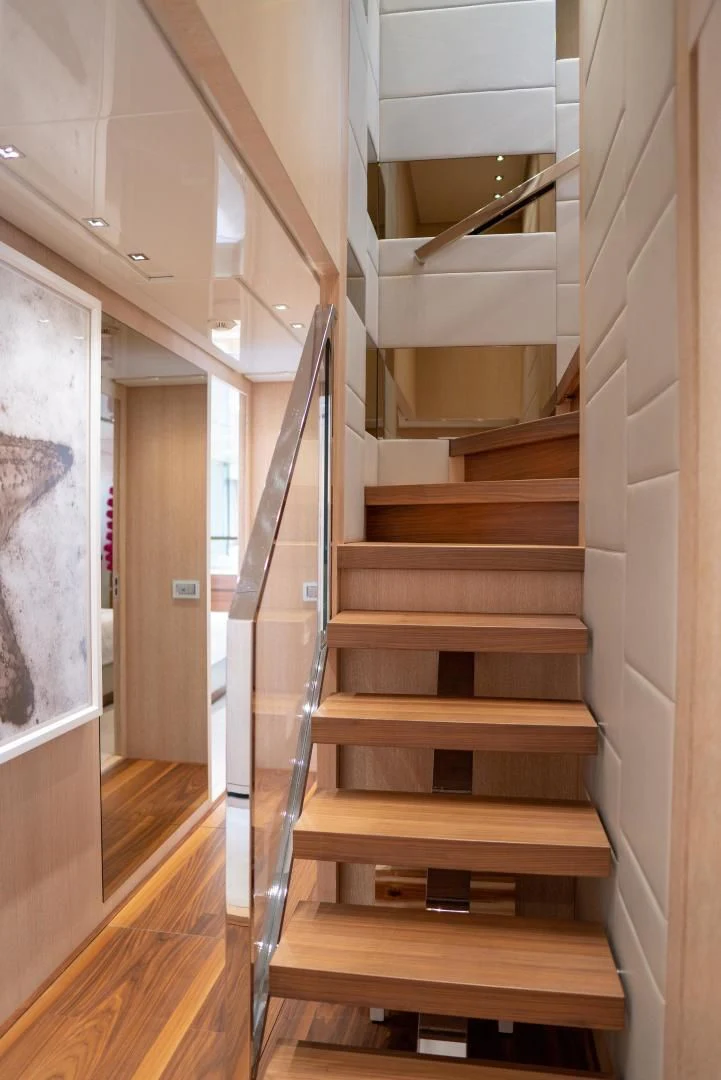 a wooden staircase in a house aboard GOLDEN YACHT Yacht for Sale