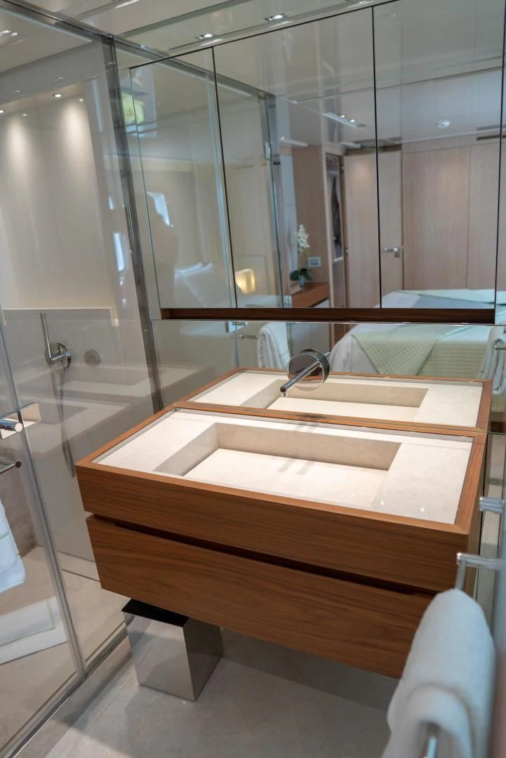 a bathroom with a large mirror aboard GOLDEN YACHT Yacht for Sale