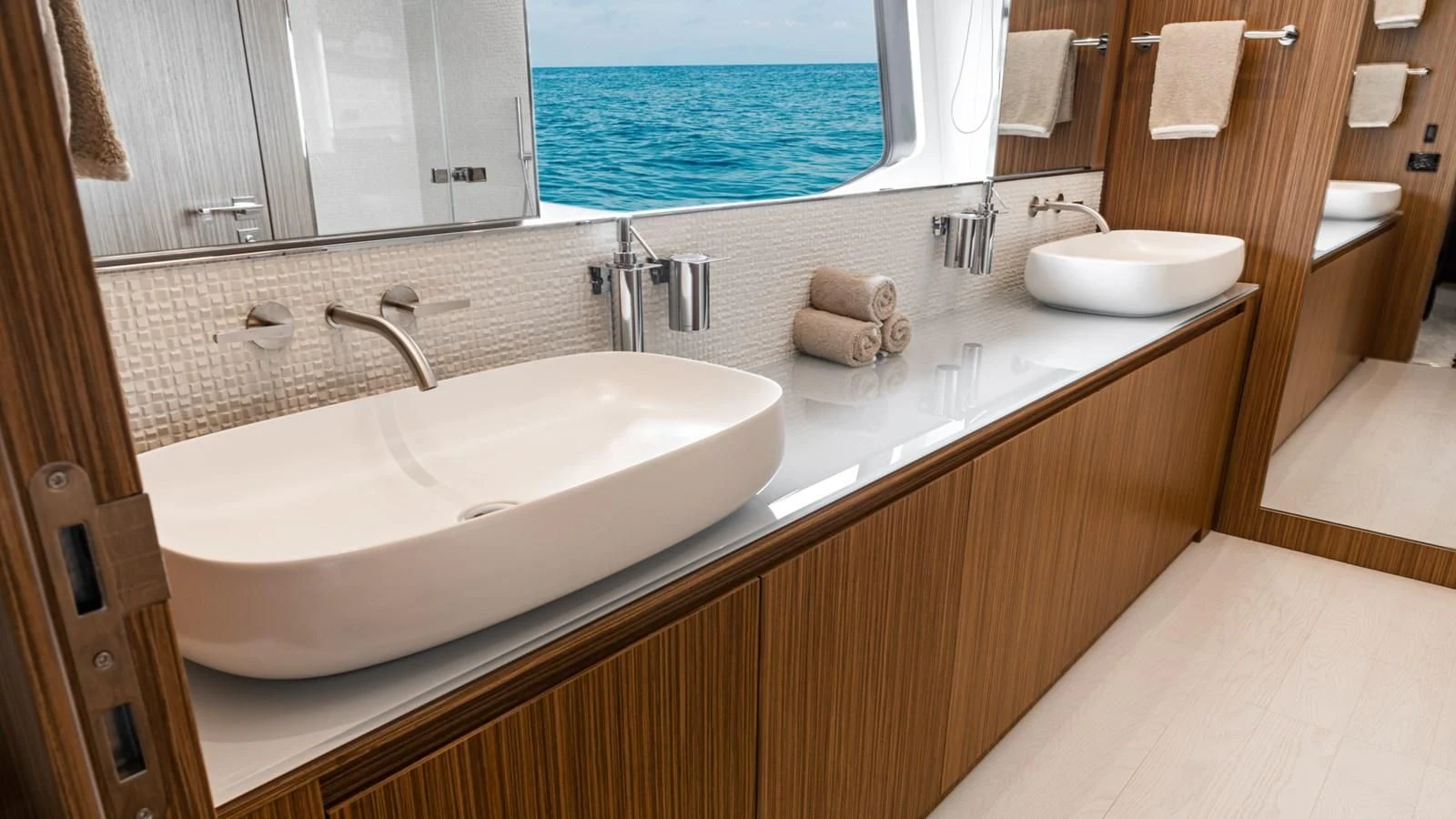 a bathroom with a large window aboard NAAV Yacht for Sale