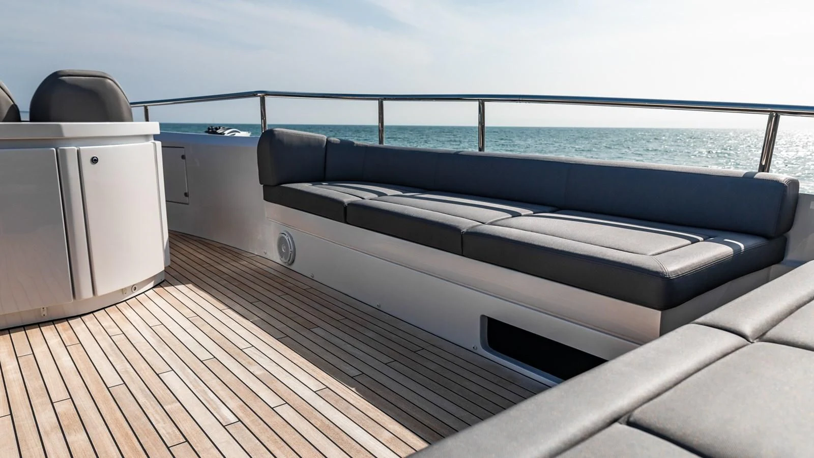 a large bed on a deck aboard NAAV Yacht for Sale