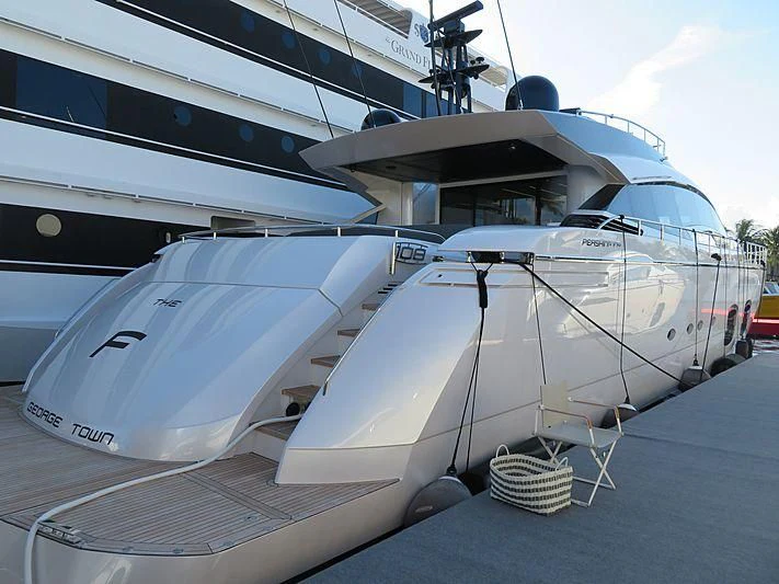 a large white airplane aboard NAAV Yacht for Sale