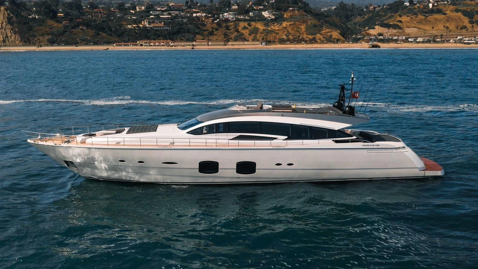 a white boat in the water aboard NAAV Yacht for Sale