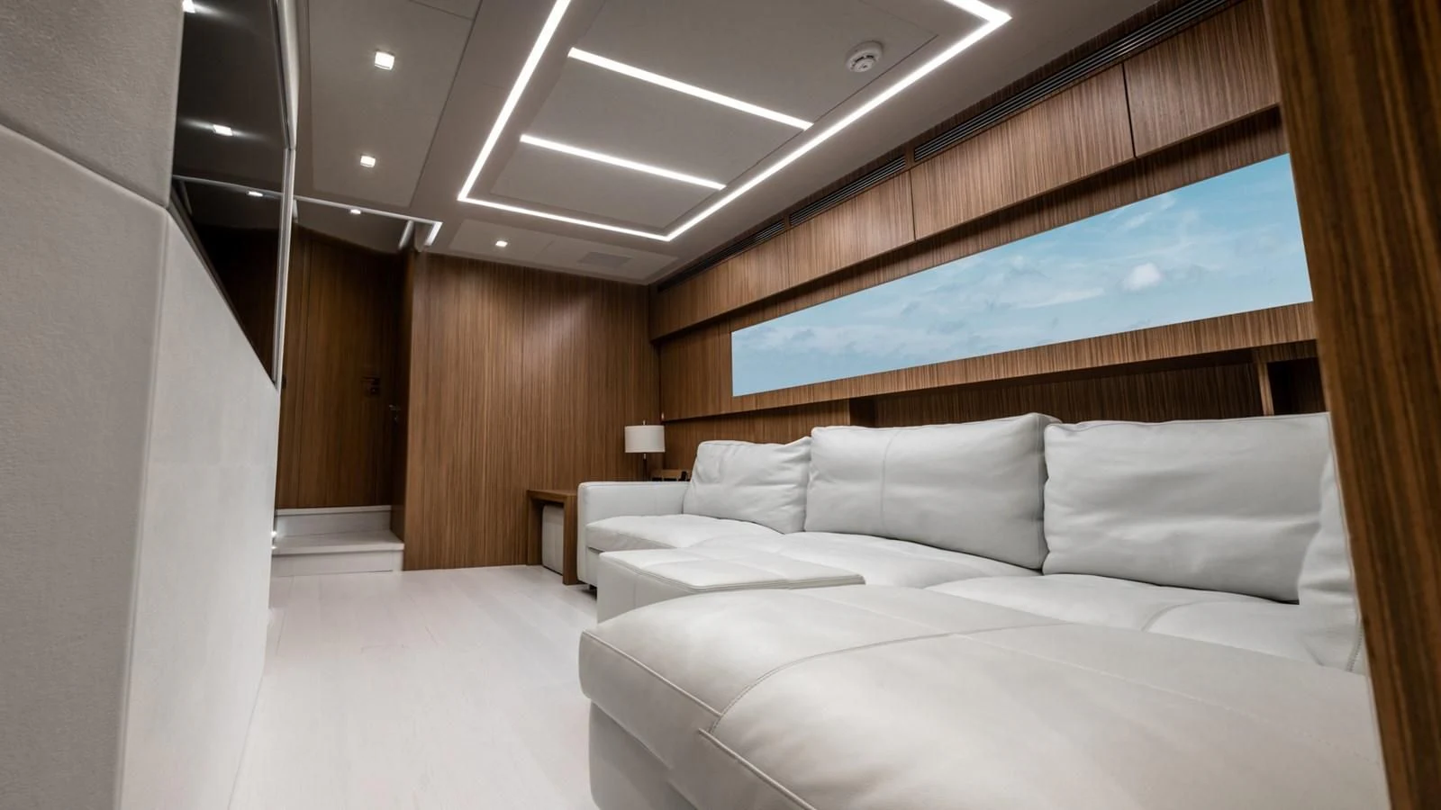 a room with a bed and a desk aboard NAAV Yacht for Sale