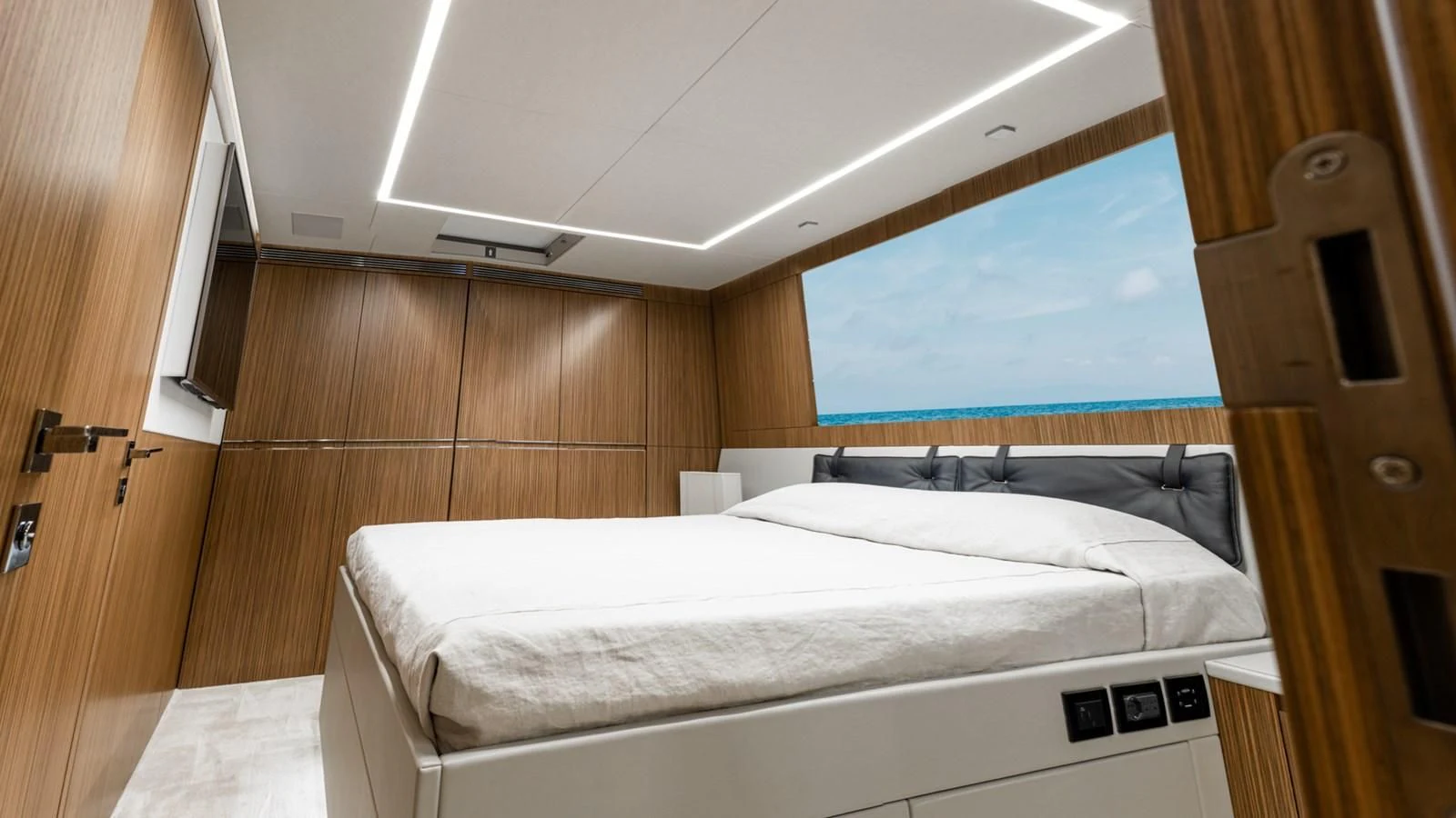 a room with two beds aboard NAAV Yacht for Sale