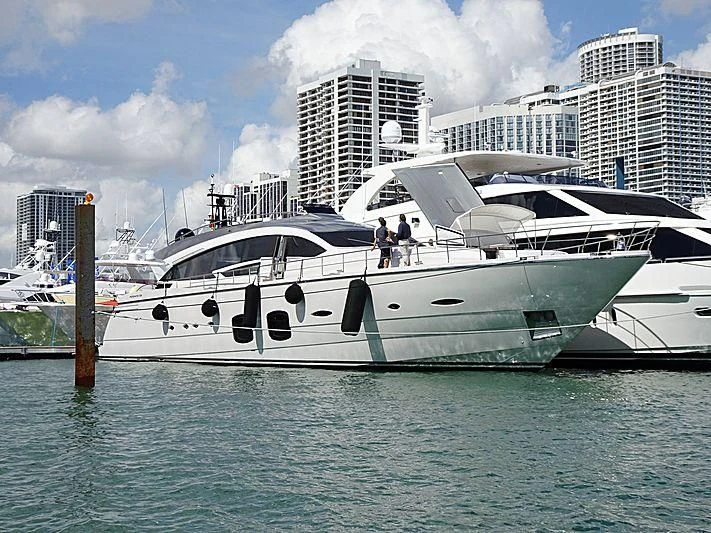 a white yacht in the water aboard NAAV Yacht for Sale
