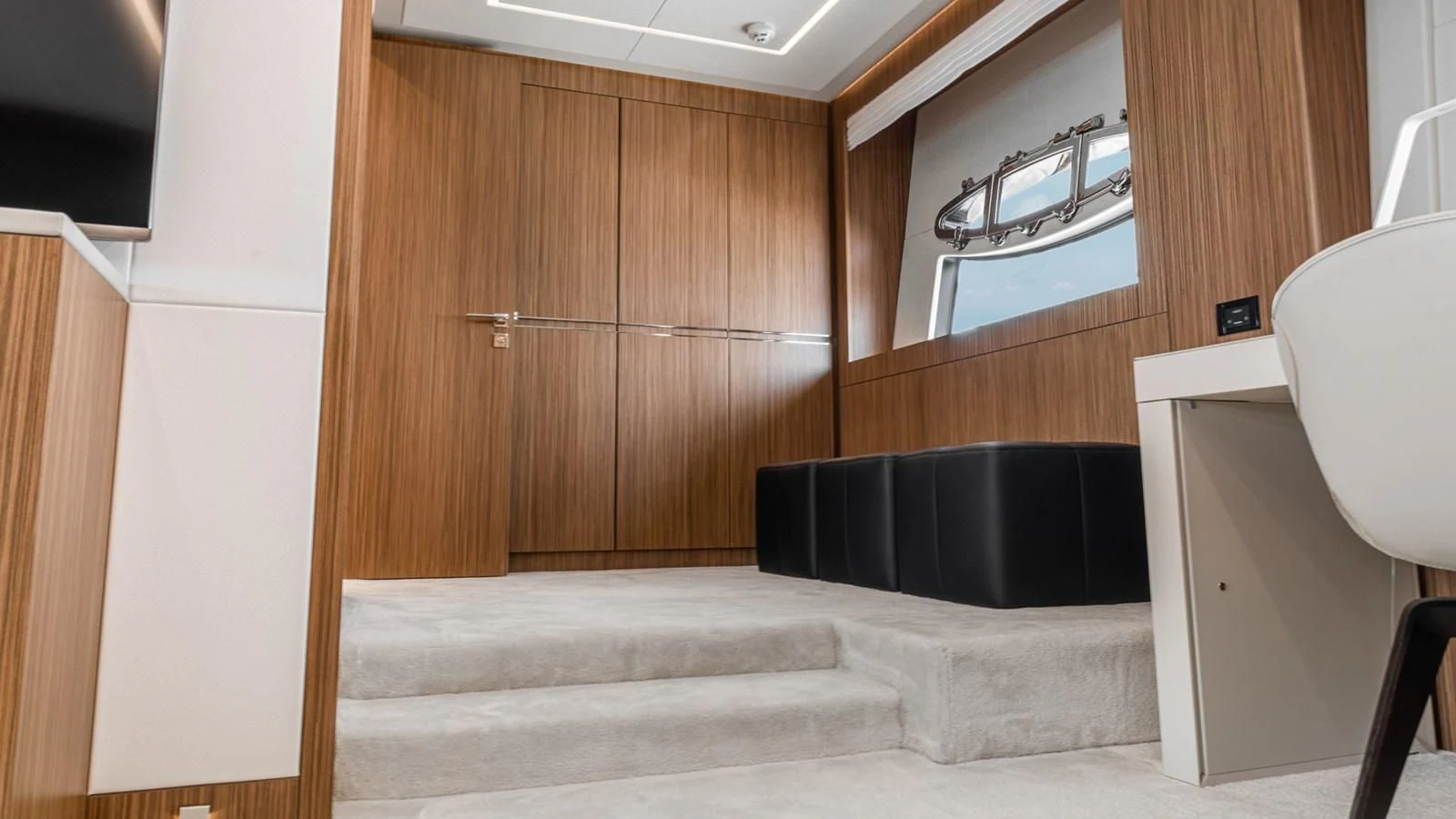 a room with a tub and a sink aboard NAAV Yacht for Sale