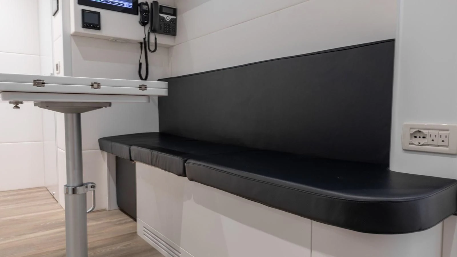 a black table with a black table aboard NAAV Yacht for Sale