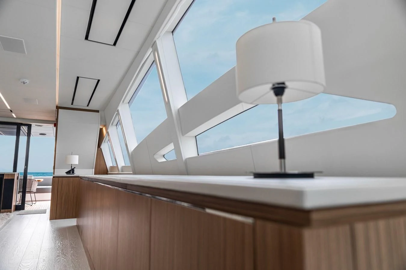 a white lamp on a counter aboard NAAV Yacht for Sale