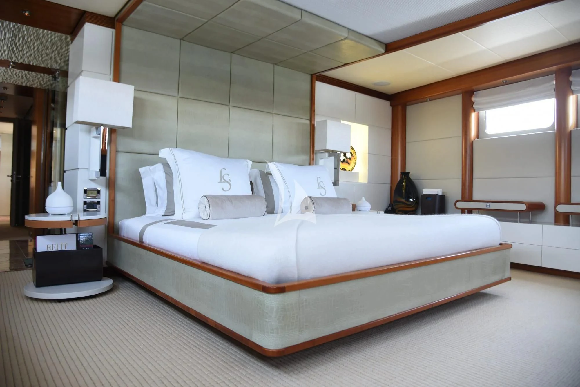 a large bed in a room aboard LIFE SAGA Yacht for Sale