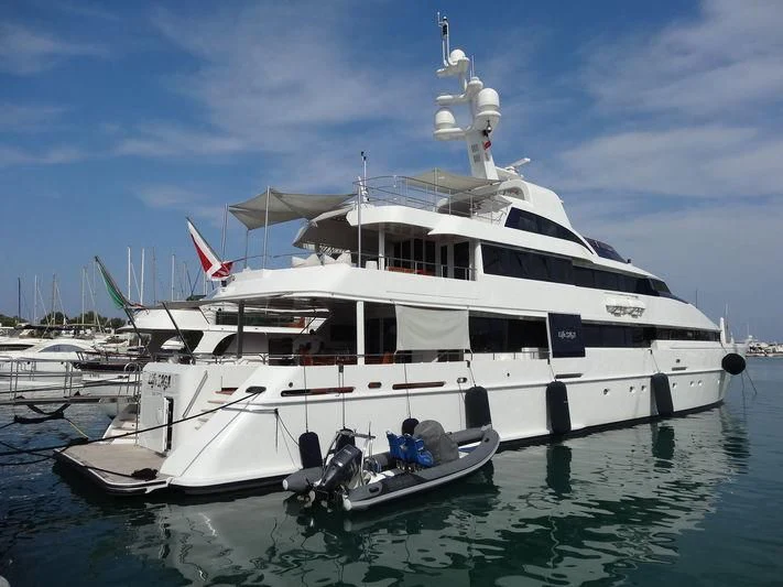 a large white boat in the water aboard LIFE SAGA Yacht for Sale