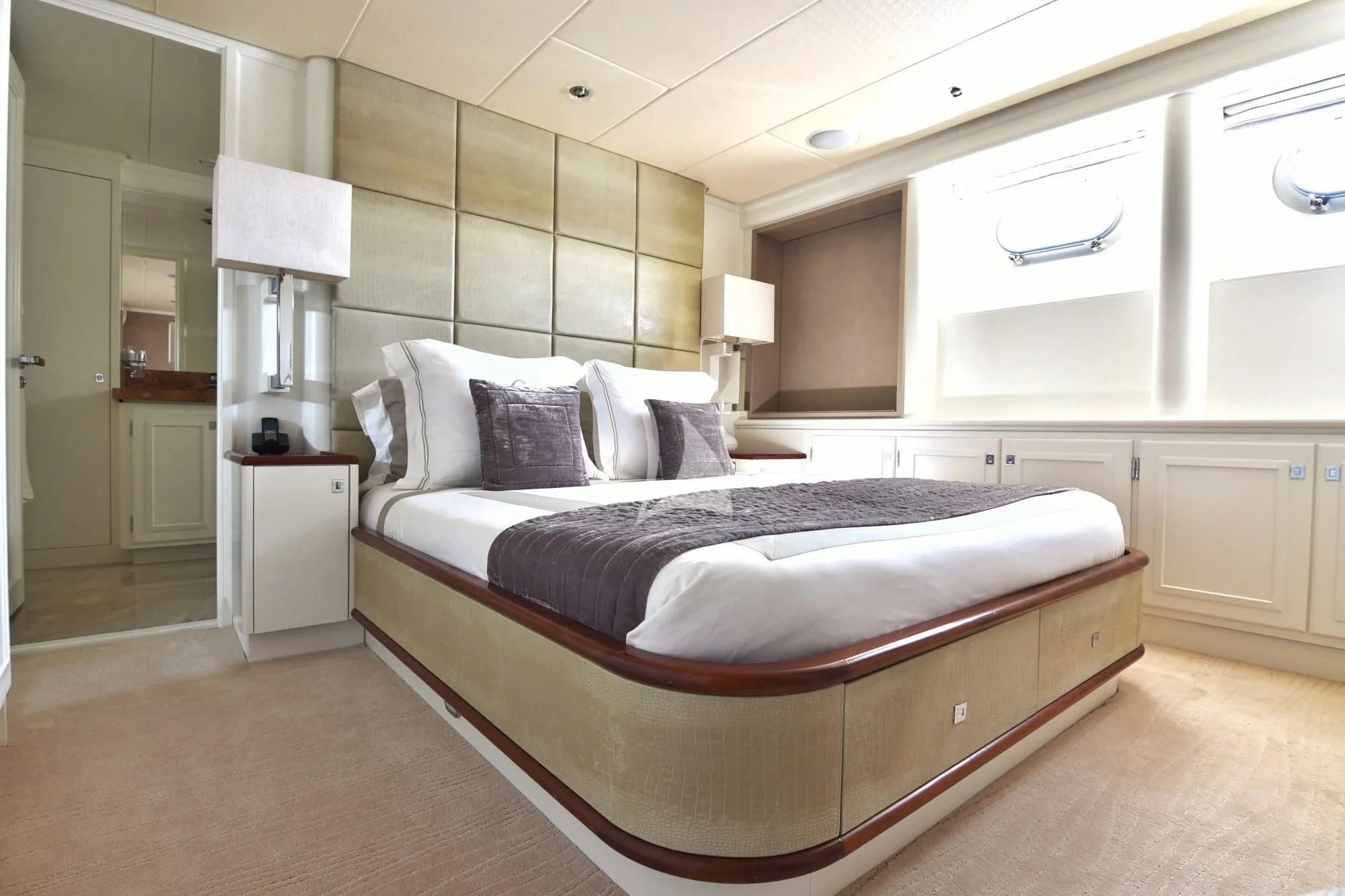 a large bed in a room aboard LIFE SAGA Yacht for Sale