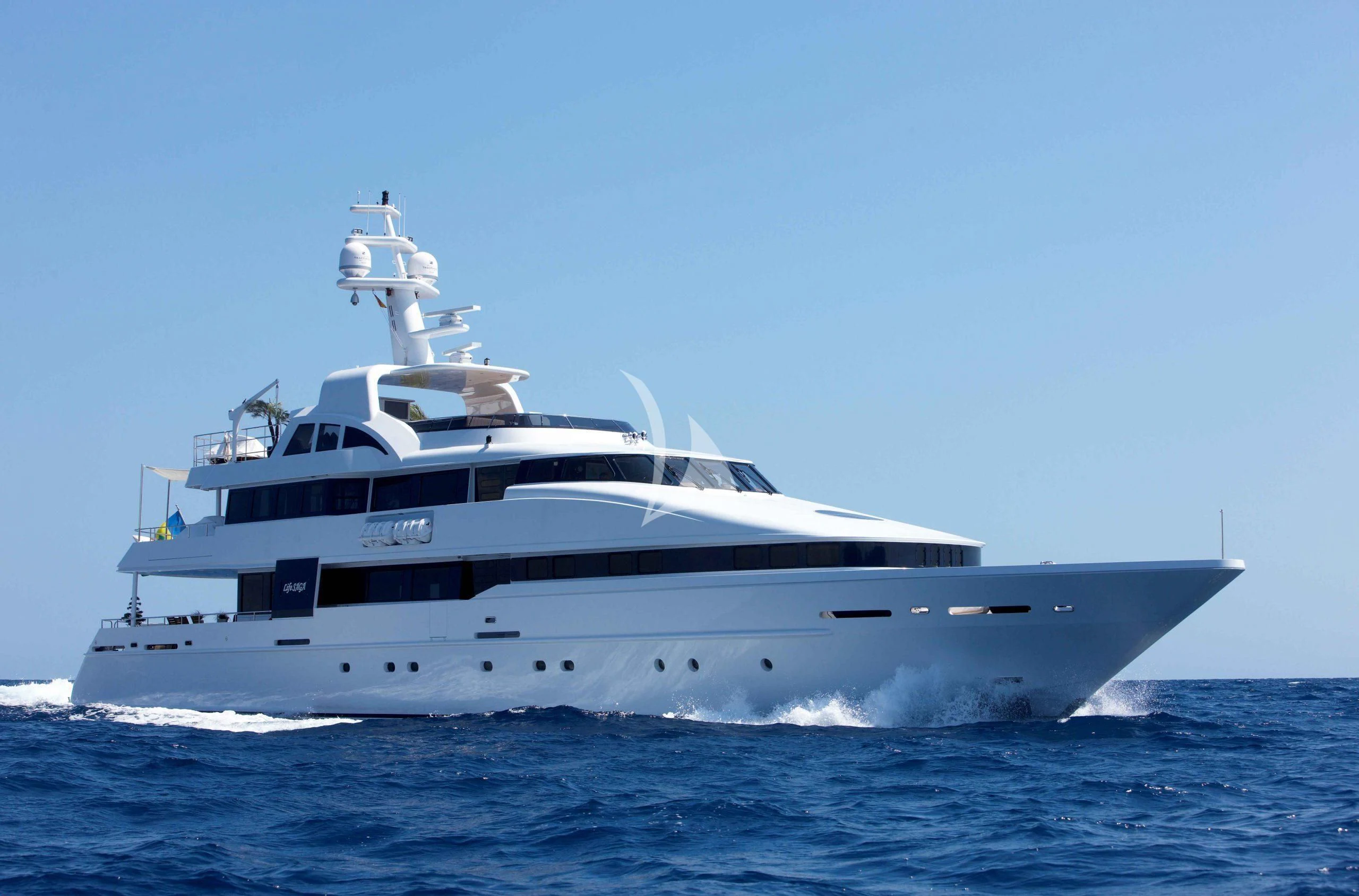 a white yacht in the water aboard LIFE SAGA Yacht for Sale