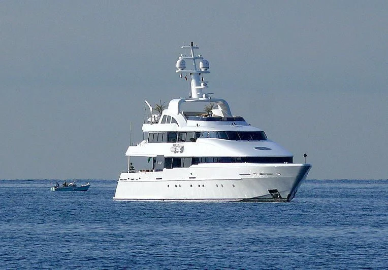a white boat in the water aboard LIFE SAGA Yacht for Sale