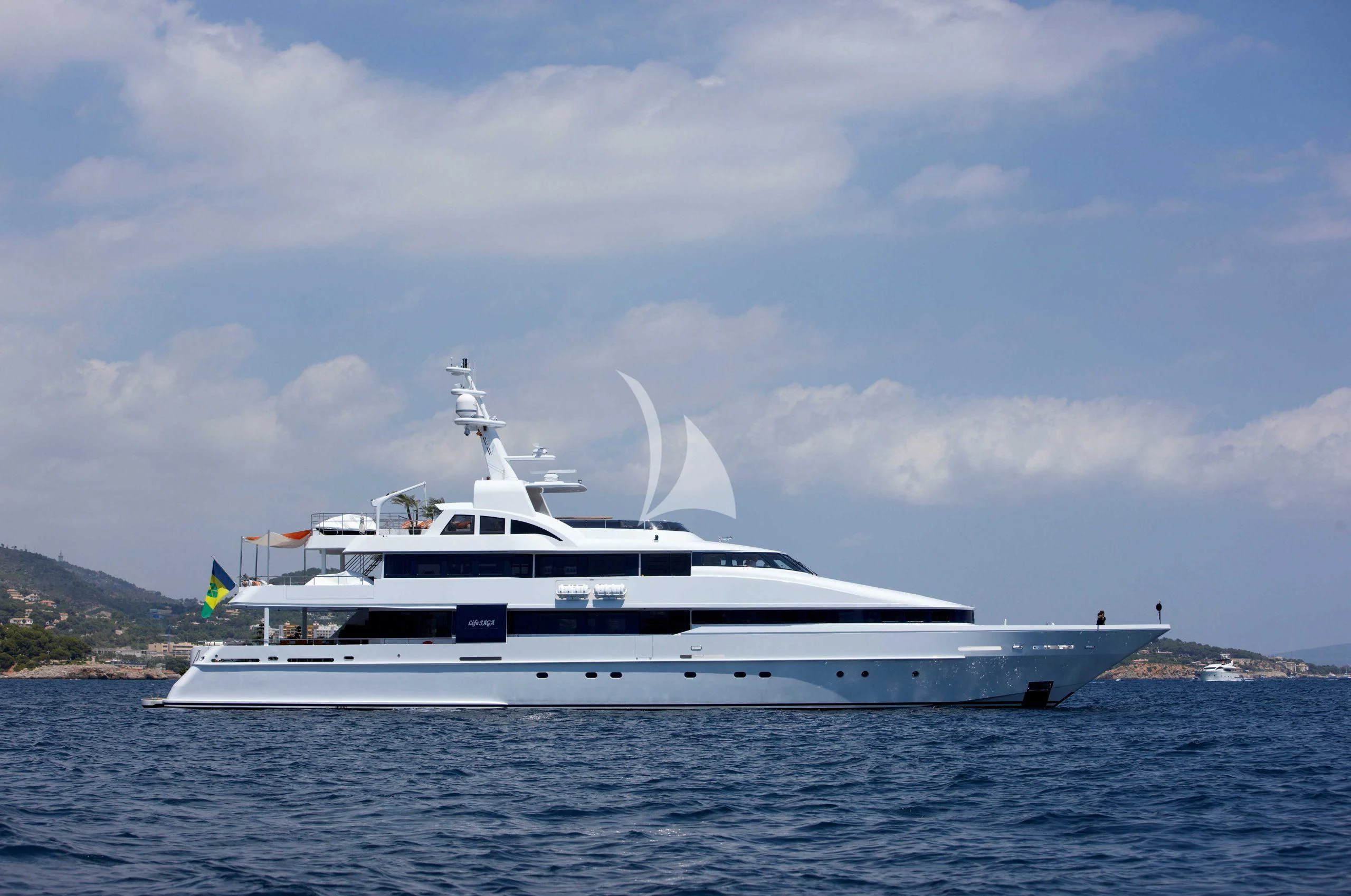 a white yacht in the water aboard LIFE SAGA Yacht for Sale