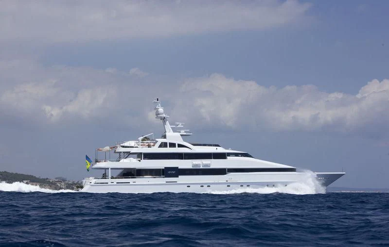 a white yacht in the water aboard LIFE SAGA Yacht for Sale