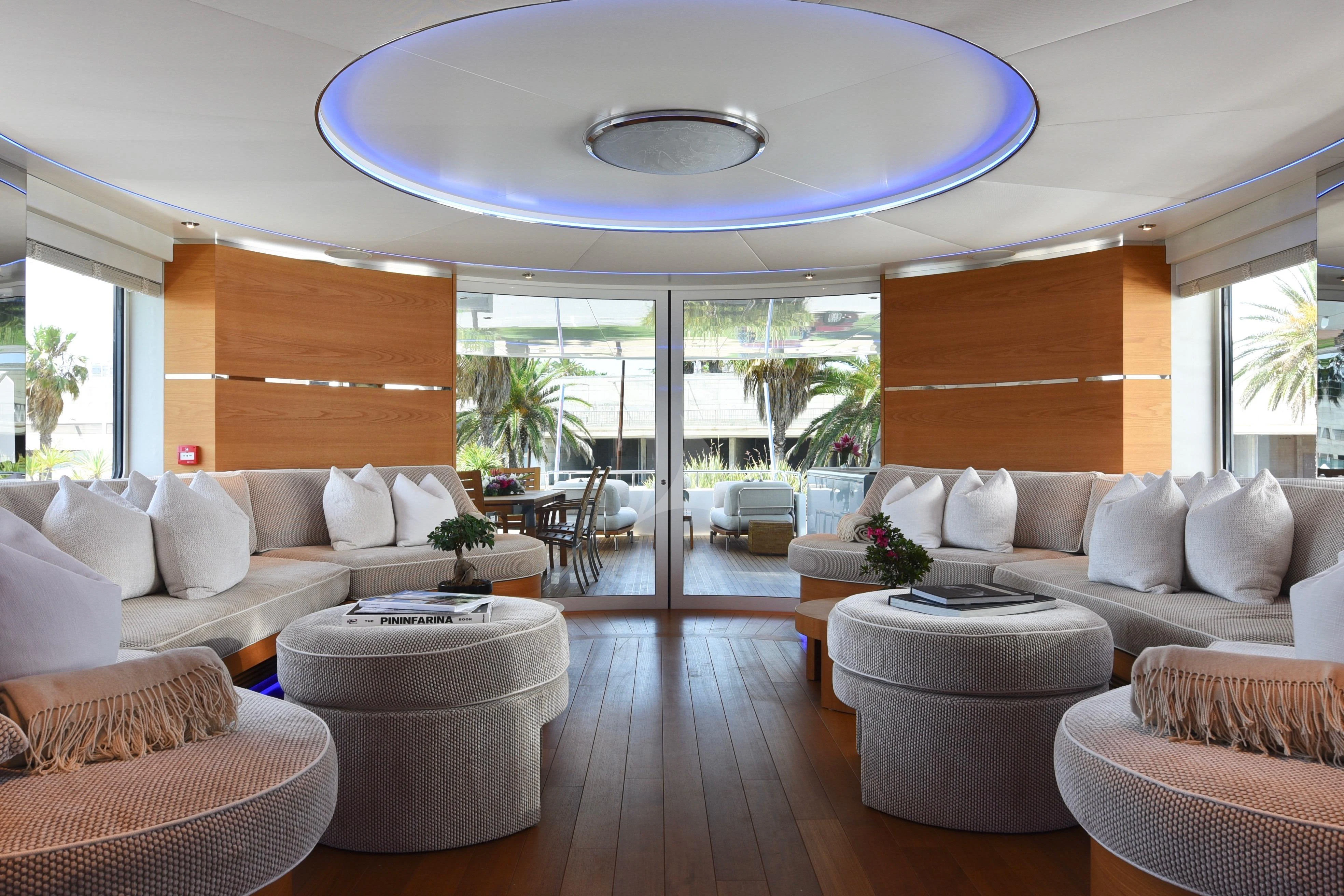 a living room with a large window aboard LIFE SAGA Yacht for Sale