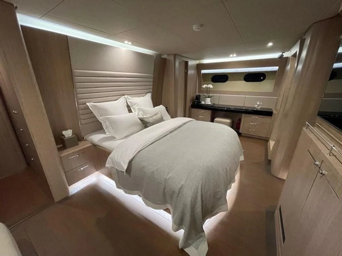 a room with two beds aboard CARPE DIEM Yacht for Sale