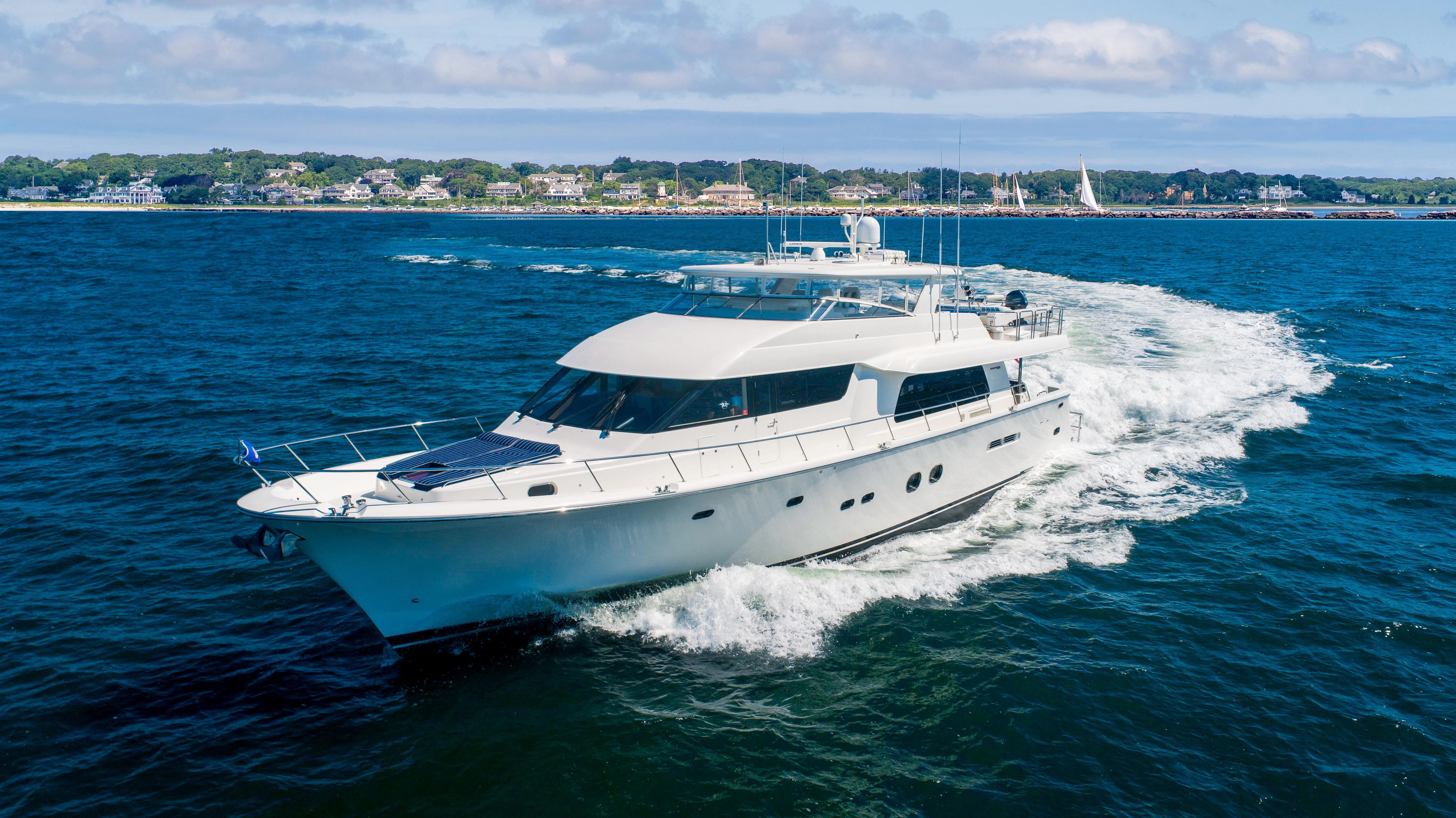 a white yacht on the water aboard CARPE DIEM Yacht for Sale