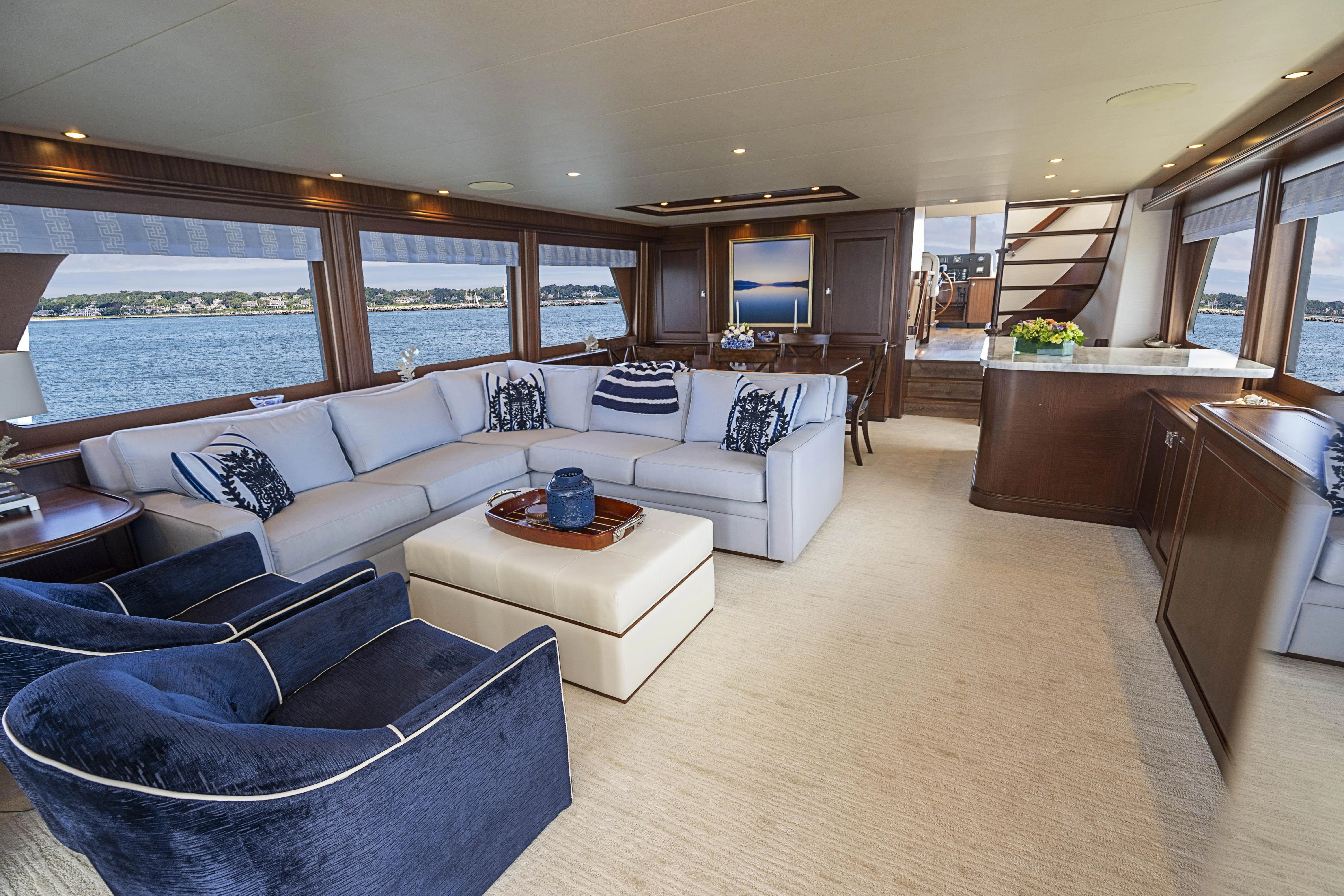 a living room with a large window aboard CARPE DIEM Yacht for Sale
