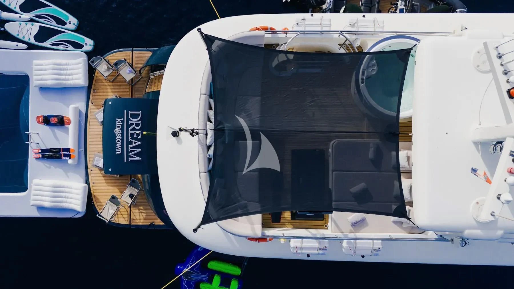 a white car with a black hood aboard CARPE DIEM Yacht for Sale