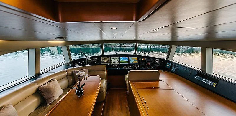 inside of a vehicle with a table and chairs and a window aboard CARPE DIEM Yacht for Sale
