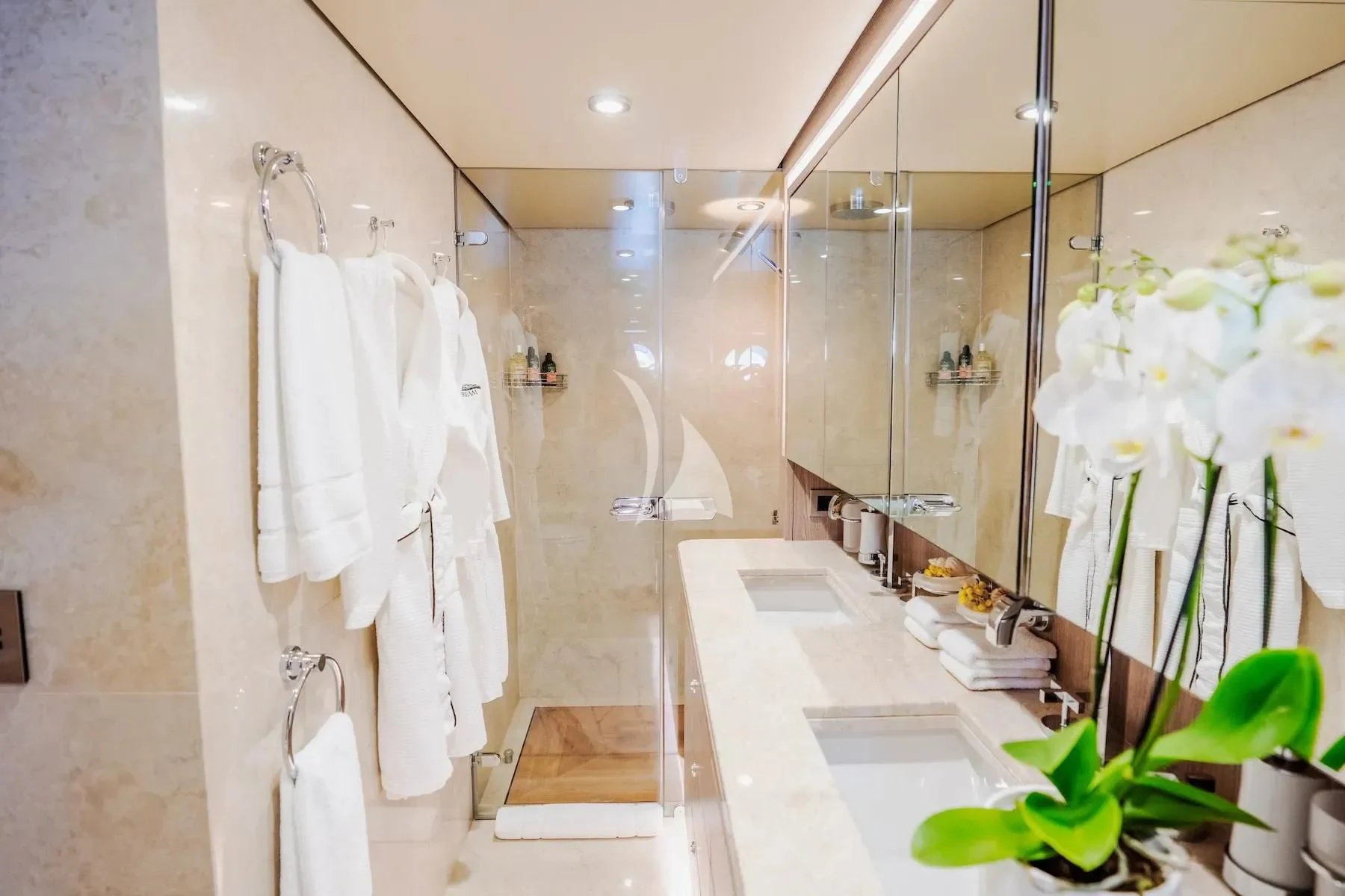 a bathroom with a large mirror aboard CARPE DIEM Yacht for Sale