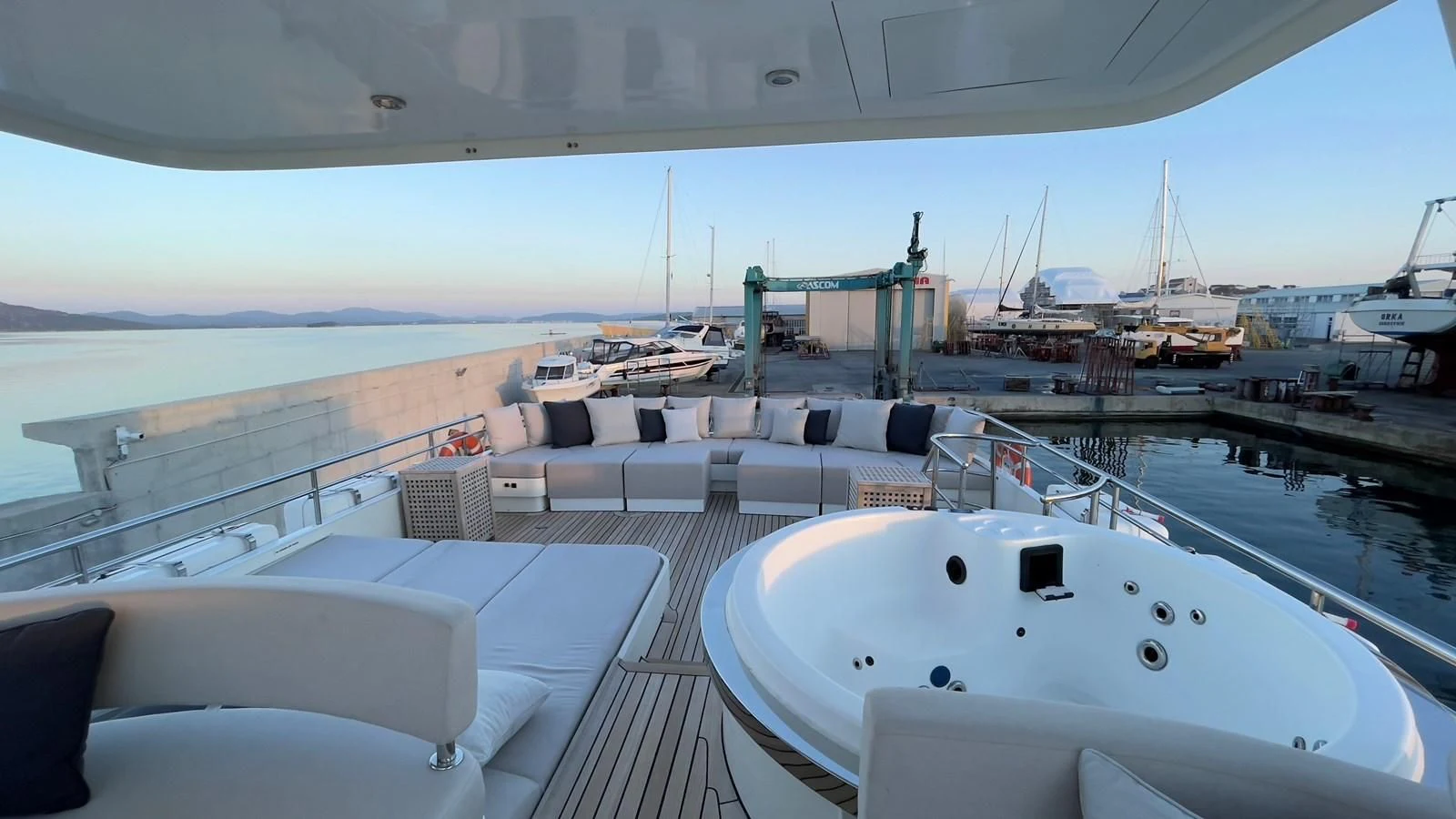 a large ship docked at a port aboard CARPE DIEM Yacht for Sale