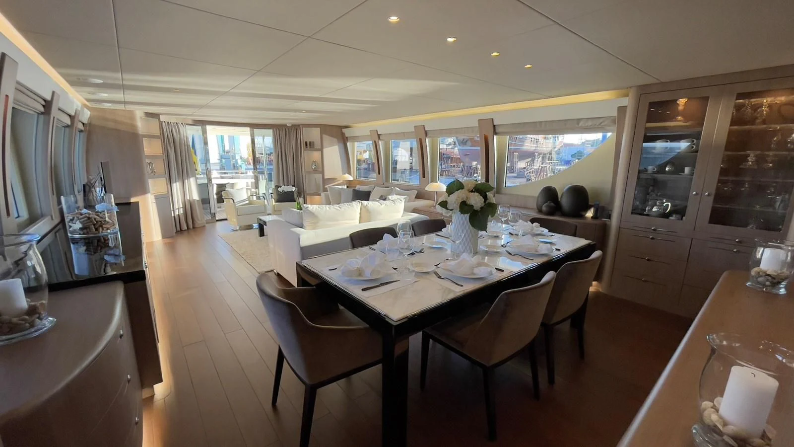 a dining room with a table and chairs aboard CARPE DIEM Yacht for Sale