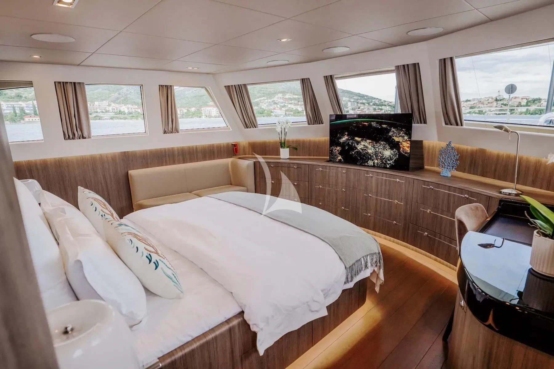 a bedroom with a large bed aboard CARPE DIEM Yacht for Sale